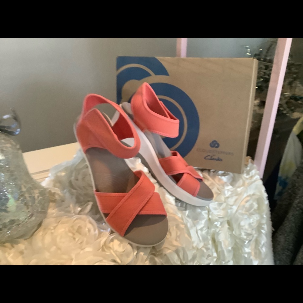 Brand new. Clarks coral wedges